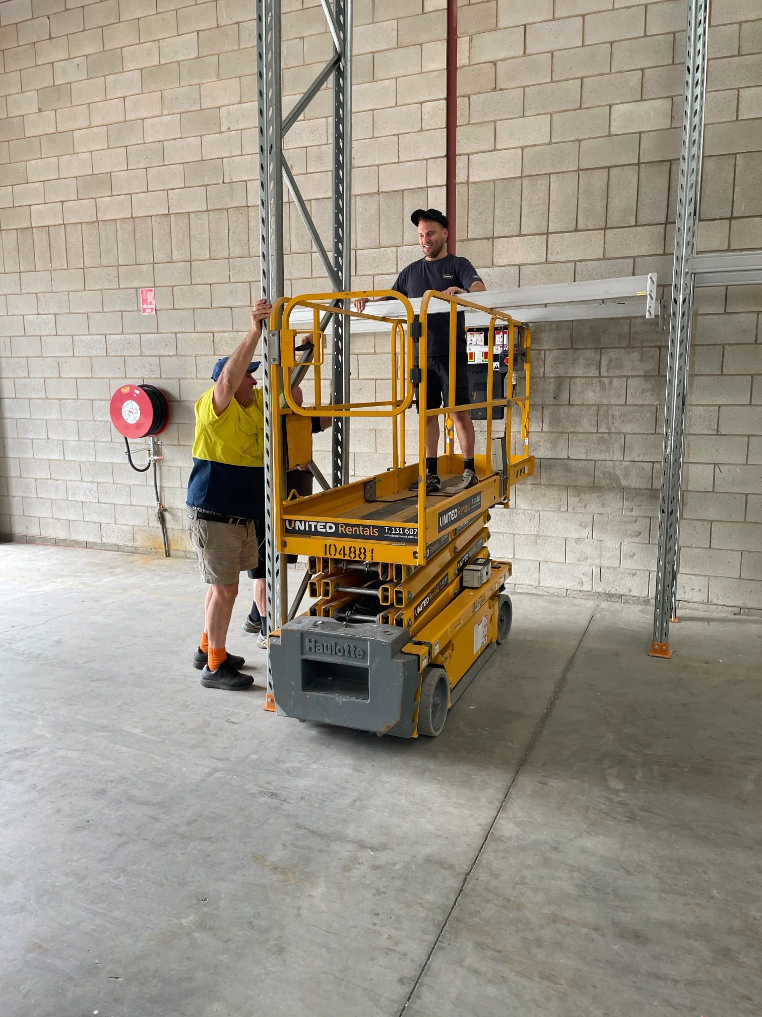 Maipac General Manager, Paul Maione On Scissor Lift in Adelaide Coffee Warehouse
